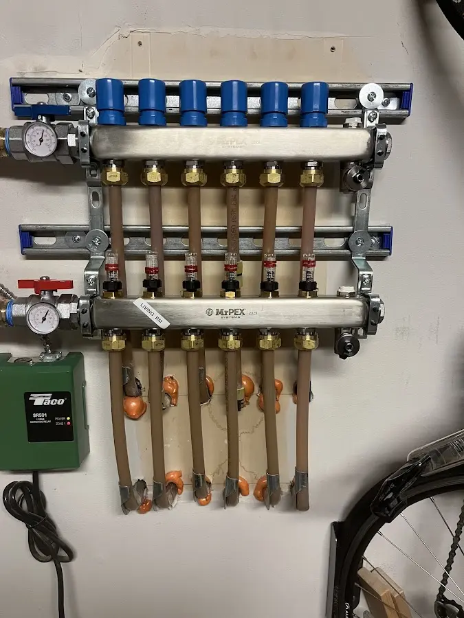 Plumber performing Water Heater Repair at a residential property in Texas City